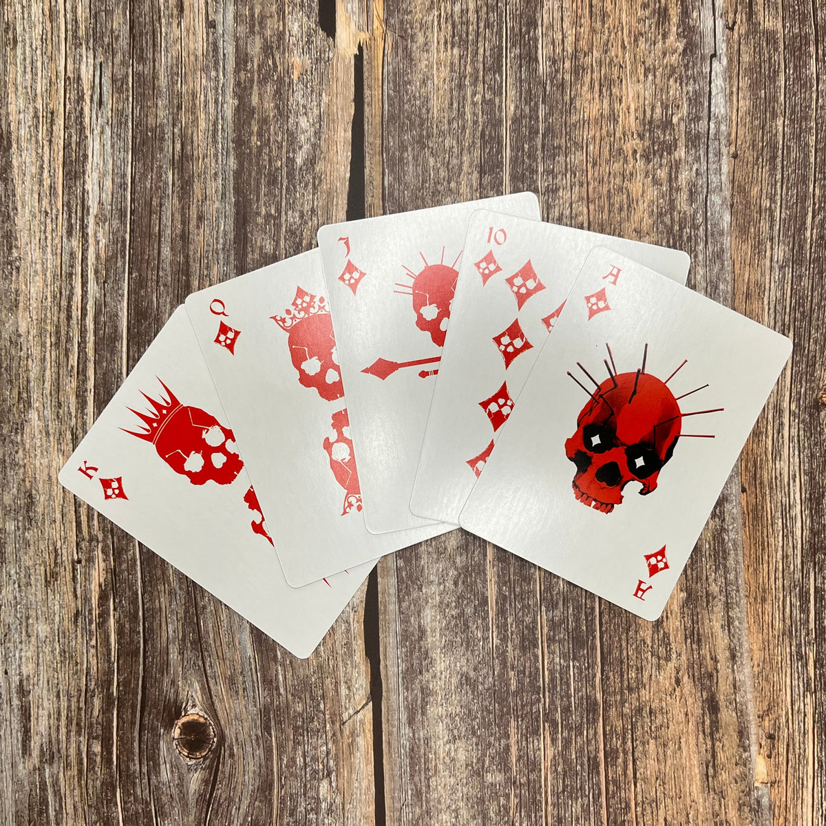 Diamond red court cards with skulls for the poker deck